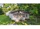 Charming home featuring a cozy screened porch and freshly mowed lawn at 637 Olin Ave, Indianapolis, IN 46222