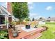 Well-maintained backyard deck perfect for entertaining with an outdoor seating and a grassy area at 662 Leah Way, Greenwood, IN 46142