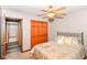 Well-lit bedroom with walk-in access, double-door closet, and neutral-toned walls at 662 Leah Way, Greenwood, IN 46142