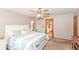 Inviting primary bedroom with a ceiling fan and ensuite bathroom access, perfect for relaxation at 662 Leah Way, Greenwood, IN 46142