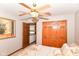 Comfortable main bedroom with a ceiling fan, closet and warm neutral walls at 662 Leah Way, Greenwood, IN 46142