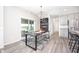 Dining room featuring a modern table and chairs, a sliding glass door and chalkboard wall decor at 7147 Prelude Rd, Brownsburg, IN 46112