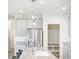 Kitchen featuring granite countertops, stainless steel appliances, and modern lighting at 7147 Prelude Rd, Brownsburg, IN 46112