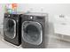 Well-equipped laundry room features a modern washer and dryer set at 7147 Prelude Rd, Brownsburg, IN 46112