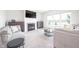 Cozy living room featuring a fireplace and views of the outdoors at 7147 Prelude Rd, Brownsburg, IN 46112