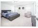 Relaxing primary bedroom with a comfortable bed, natural light, and stylish furnishings at 7147 Prelude Rd, Brownsburg, IN 46112