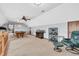 Spacious bonus room featuring a pool table, wine rack, and comfortable seating area at 7304 E Stop 11 Rd, Indianapolis, IN 46259
