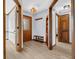 Home foyer with natural light, wooden accents and stylish flooring at 7304 E Stop 11 Rd, Indianapolis, IN 46259