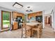 Charming kitchen with wood cabinets, a center island, and modern appliances at 7304 E Stop 11 Rd, Indianapolis, IN 46259