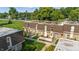 Overhead view of townhomes showing manicured lawns and mature trees at 7468 Countrybrook Dr, Indianapolis, IN 46260