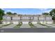 Charming townhome exteriors with gray siding, white trim, and well-manicured front lawns at 7693 Marin Pkwy, Cumberland, IN 46229