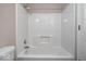 Bathroom with a white shower-tub combo at 8213 Thoroughbred Run, Indianapolis, IN 46256