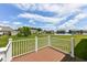 Backyard view from deck featuring lawn at 8864 Rowling Way, Indianapolis, IN 46239