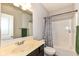 Bathroom featuring single sink vanity and shower with curtain at 8864 Rowling Way, Indianapolis, IN 46239