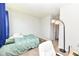 Cozy bedroom with ample natural light, a desk, and carpeted floors at 8864 Rowling Way, Indianapolis, IN 46239