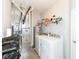 Laundry room with washer, dryer, furnace, and shelving at 8864 Rowling Way, Indianapolis, IN 46239