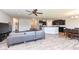 Inviting living space with open layout between kitchen, dining area, and living room at 8864 Rowling Way, Indianapolis, IN 46239