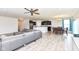 Open-concept living space connecting living room, kitchen, and dining areas at 8864 Rowling Way, Indianapolis, IN 46239