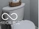Simple well-lit bathroom with white toilet and tile at 8866 Twain Ln, Indianapolis, IN 46239