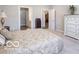 Spacious bedroom features a comfortable bed, large dresser, and neutral color scheme at 8866 Twain Ln, Indianapolis, IN 46239
