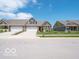 Charming single-Gathering home featuring a two-car garage, well-manicured lawn, and inviting curb appeal at 8866 Twain Ln, Indianapolis, IN 46239