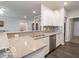 Granite countertops, stainless steel appliances, and white cabinetry in modern kitchen at 8866 Twain Ln, Indianapolis, IN 46239