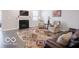 Cozy living room featuring a fireplace, plush seating, and a relaxing ambiance, perfect for unwinding after a long day at 8866 Twain Ln, Indianapolis, IN 46239