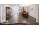 Spacious open-concept living and dining area featuring hardwood floors, perfect for entertaining at 8866 Twain Ln, Indianapolis, IN 46239