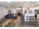 Open concept living area connected to the kitchen and dining space, perfect for entertaining and everyday living at 8866 Twain Ln, Indianapolis, IN 46239