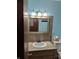 Bathroom vanity with mirror, lighting, and sink at 8923 Maze Rd, Indianapolis, IN 46259