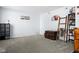 A carpeted bedroom with neutral paint, and curated decor at 901 Mallory Pkwy, Franklin, IN 46131