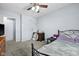 Bright bedroom provides a peaceful retreat, complete with a ceiling fan for added comfort and a neutral color palette at 901 Mallory Pkwy, Franklin, IN 46131