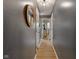 Hallway featuring hardwood floors, neutral paint, and access to multiple rooms at 911 Glendale Dr, Lebanon, IN 46052