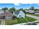 Aerial view of a charming house with a manicured lawn and surrounding neighborhood at 95 S 11Th Ave, Beech Grove, IN 46107