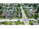 Birds-eye view of a charming neighborhood street showcasing well-maintained lawns and various parked vehicles at 95 S 11Th Ave, Beech Grove, IN 46107