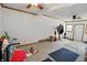 Carpeted bonus room with two entrances, ceiling fans, and ample space at 95 S 11Th Ave, Beech Grove, IN 46107