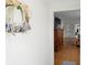 Inviting living room with hardwood floors and a glimpse into other rooms, enhancing the home's appeal at 95 S 11Th Ave, Beech Grove, IN 46107