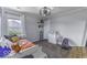 Cozy bedroom with a large window, comfortable bed, and playful decor, perfect for a  at 9628 Gull Lake Dr, Indianapolis, IN 46239