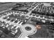 Overhead view of a neighborhood highlighting the community playground with easy access for the residents at 9855 Oakmont E E Dr, Pendleton, IN 46064