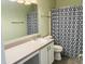 Bathroom featuring a sink with a large mirror and a shower with a decorative shower curtain at 9987 Rainbow Falls Ln, Fishers, IN 46037