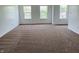 Bright bedroom with three large windows providing ample natural light at 9987 Rainbow Falls Ln, Fishers, IN 46037
