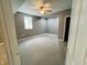 Spacious bedroom features ample lighting and a roomy walk-in closet at 9987 Rainbow Falls Ln, Fishers, IN 46037