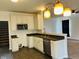 Well-equipped kitchen featuring ample cabinet space, and modern appliances at 9987 Rainbow Falls Ln, Fishers, IN 46037