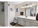 Well-lit bathroom featuring a gray vanity and a quirky Star Wars theme at 10519 N Antioch Rd, Mooresville, IN 46158