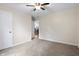 Bedroom with neutral walls, carpet, and an open doorway at 10519 N Antioch Rd, Mooresville, IN 46158