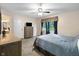 Serene bedroom with a full bed with blue furnishings, natural light, and neutral carpet at 10519 N Antioch Rd, Mooresville, IN 46158