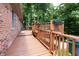 A wood deck, perfect for outdoor relaxation, overlooks a lush, green yard at 10519 N Antioch Rd, Mooresville, IN 46158