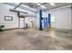 This expansive garage with auto lifts offers ample space for projects at 10519 N Antioch Rd, Mooresville, IN 46158