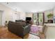 Cozy living room featuring hardwood floors and comfortable seating arrangement at 10519 N Antioch Rd, Mooresville, IN 46158