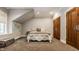 Cozy bedroom with a unique bed frame, soft lighting, and ample space for relaxation at 110 Bow Ln, Indianapolis, IN 46220
